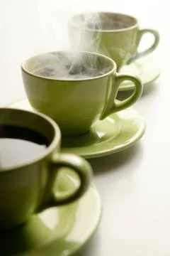 Three steaming mugs 2 Stock Photos