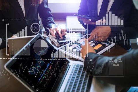 Three stock traiders making analysis of digital market and investment in bloc Stock Photos