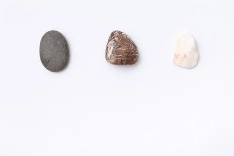 Three stone, rock on white isolated paper Stock Photos