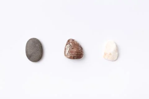 Three stone, rock on white isolated paper Stock Photos