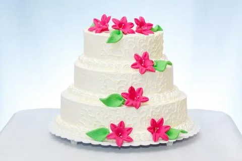 Three-storied wedding cake Stock Photos