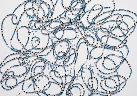 Three strands of beads Stock Photos