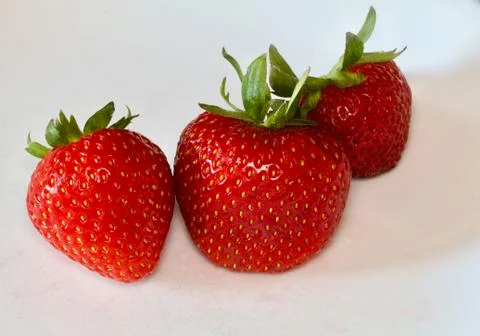 Three Strawberries Stock Photos