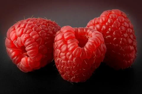 Three strawberries Stock Photos