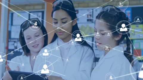 Three student scientists tapping tablet screen activating network map expanding Video stock 312638410