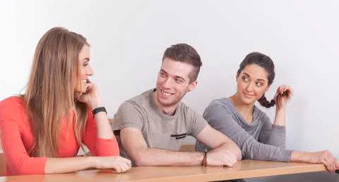 Three students in lecture hall Stock-Fotos