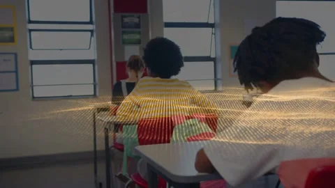 Three students, right pupil writing, frames starting gold wave sweeping across Stock Footage 333446318