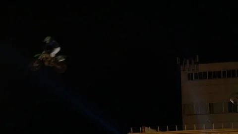 Three stunt motorcyclists do stunts in the air Video stock 120539208