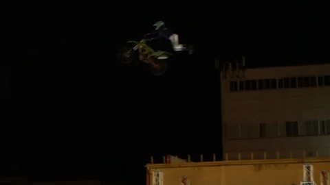 Three stunt motorcyclists do stunts in the air Video stock 120539215