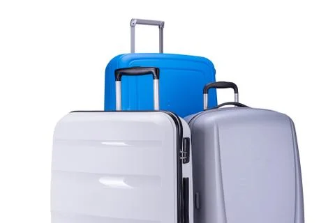 Three suitcases isolated on white background Foto stock