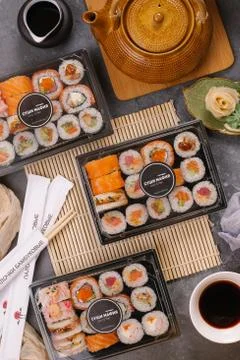 Three sushi on the table, top view. Multiple sushi dishes Foto stock
