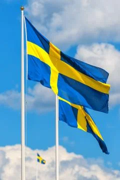 Three swedish flags Stock Photos