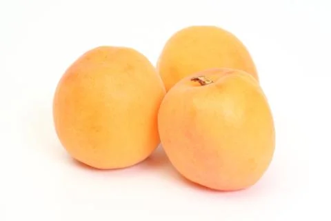 Three sweet apricots Stock Photos