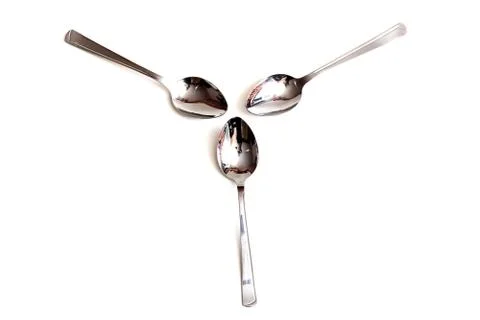 Three table spoons on a white background Stock Photos