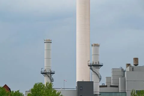 Three tall white storage columns with mid level catwalk in Flensburg Stock Photos