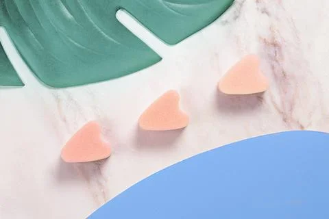 Three tampons stringless between leaves Stock Photos