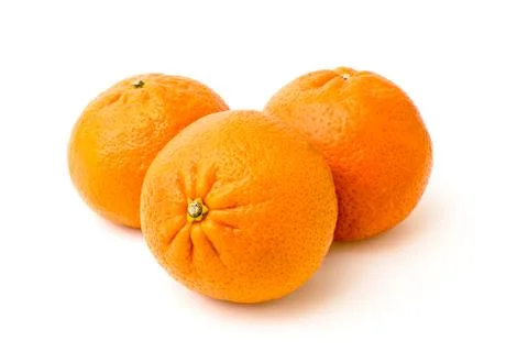 Three tangerine on a white Stock Photos