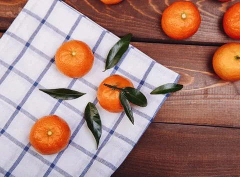 Three tangerines Stock Photos