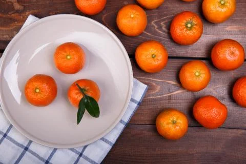 Three tangerines Stock Photos