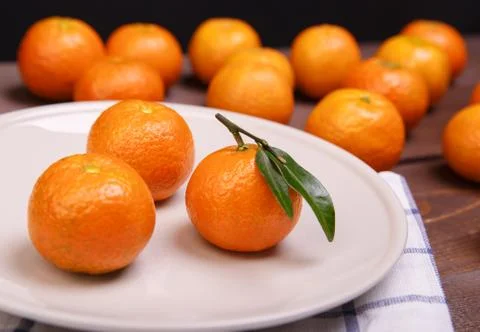 Three tangerines Stock Photos