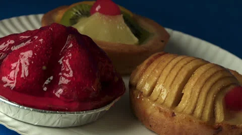 Three tarts confectionary Stock Footage 24948333