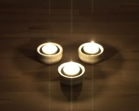 Three tea candles blown out Stock Footage 63015
