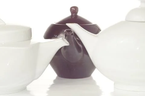 Three tea pot isolated on white Stock Photos