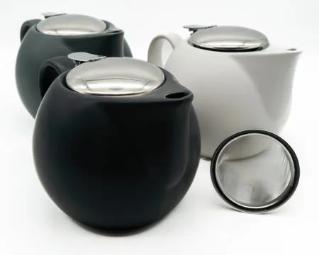 Three Teapots on white Background Cut-Out Stock Photos