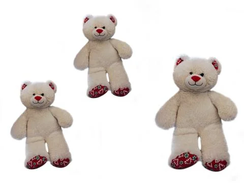 Three teddy bears in difference size on white background 스톡 사진