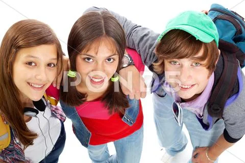 Three teenagers in casual clothes posing in front of camera Stock Photos