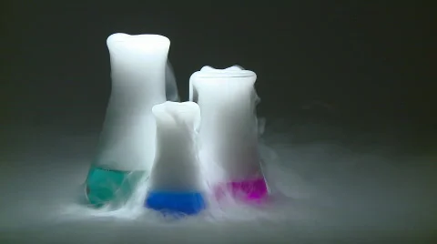 Three test tubes in action Stock Footage 275421