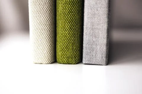 Three textile photobooks on the table Stock Photos