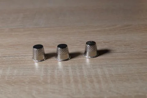 Three thimble Stock Photos