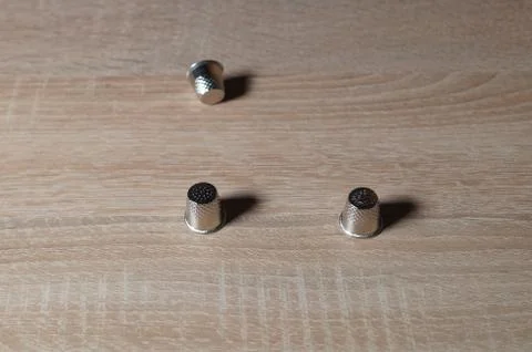 Three thimble Stock Photos