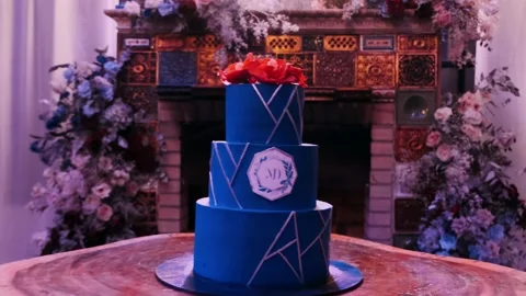 Three tier blue big cake Stock Footage 233885410