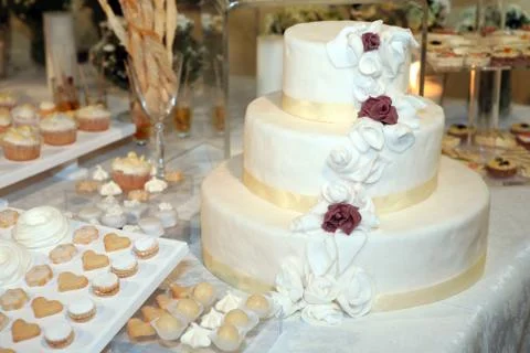 Three tiered wedding cake Stock Photos