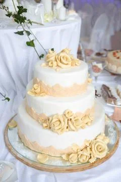 Three tiered wedding cake Stock Photos
