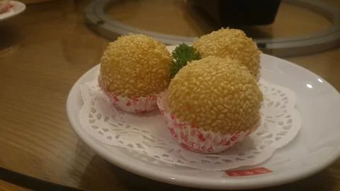 Three tiny, delightful onde-onde, too tempting to resist Stock Photos