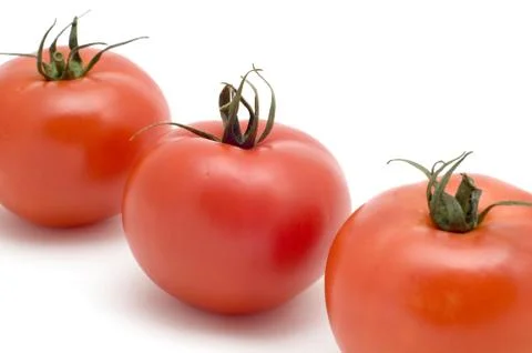 Three tomato close up Stock Photos