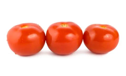Three tomato isolated Foto stock
