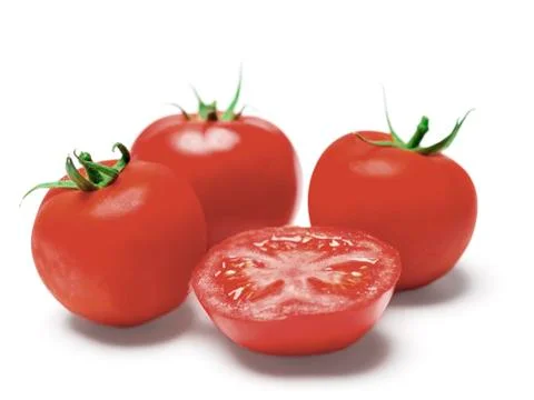 Three tomatoes and a half Stock Photos