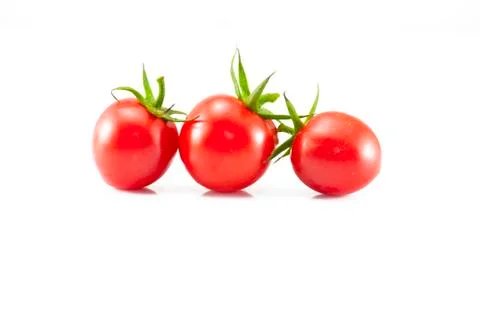 Three tomatoes isolated on white background Foto stock