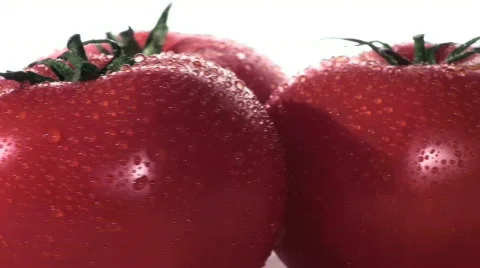 Three tomatoes loop  - HD  Stock Footage 371749