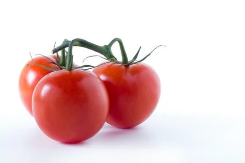 Three tomatoes Stock Photos