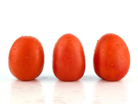Three tomatoes Stock Photos