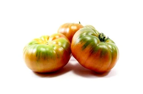 Three tomatoes on white background Stock Photos