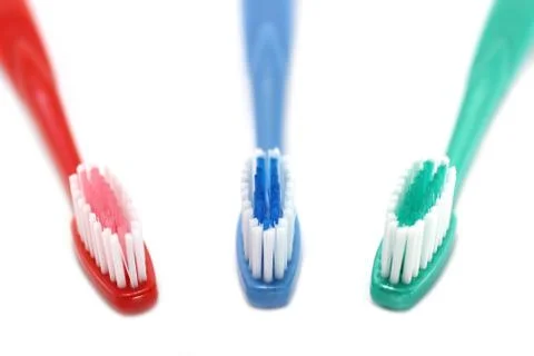Three tooth brushes Stock Photos