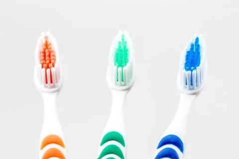 Three toothbrushs Stock Photos