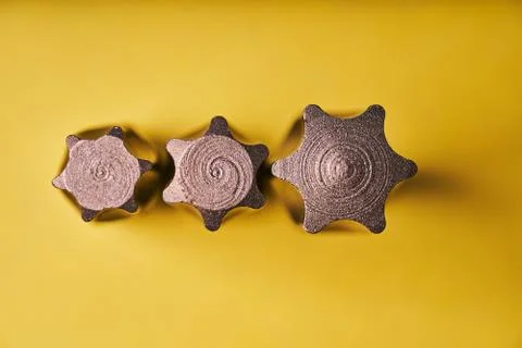 Three Torx bits for the screwdriver on a yellow background. Top view Stock-Fotos