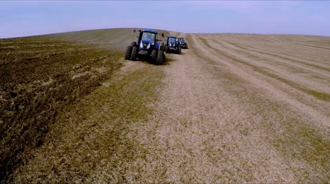 Three tractor works the soil with subsoiler. Aerial shot Stock Footage 55787147